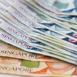 USD/SGD scales 7 1/2-month peak as Fed flags slower easing